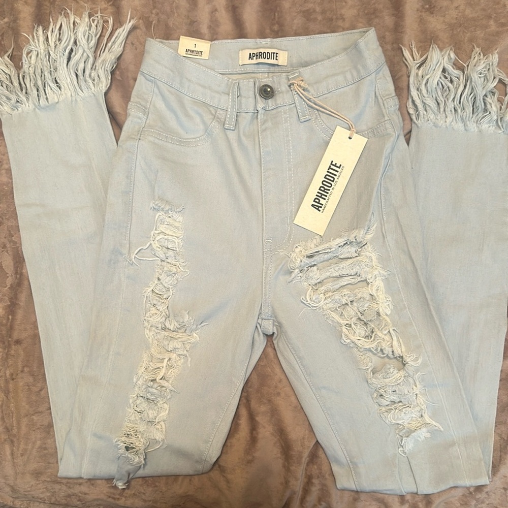 Women’s high waist ripped jeans size 0